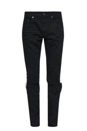 Jeansy z dziurami, zdjęcie 1 Jeansy z dziurami od Saint Laurent